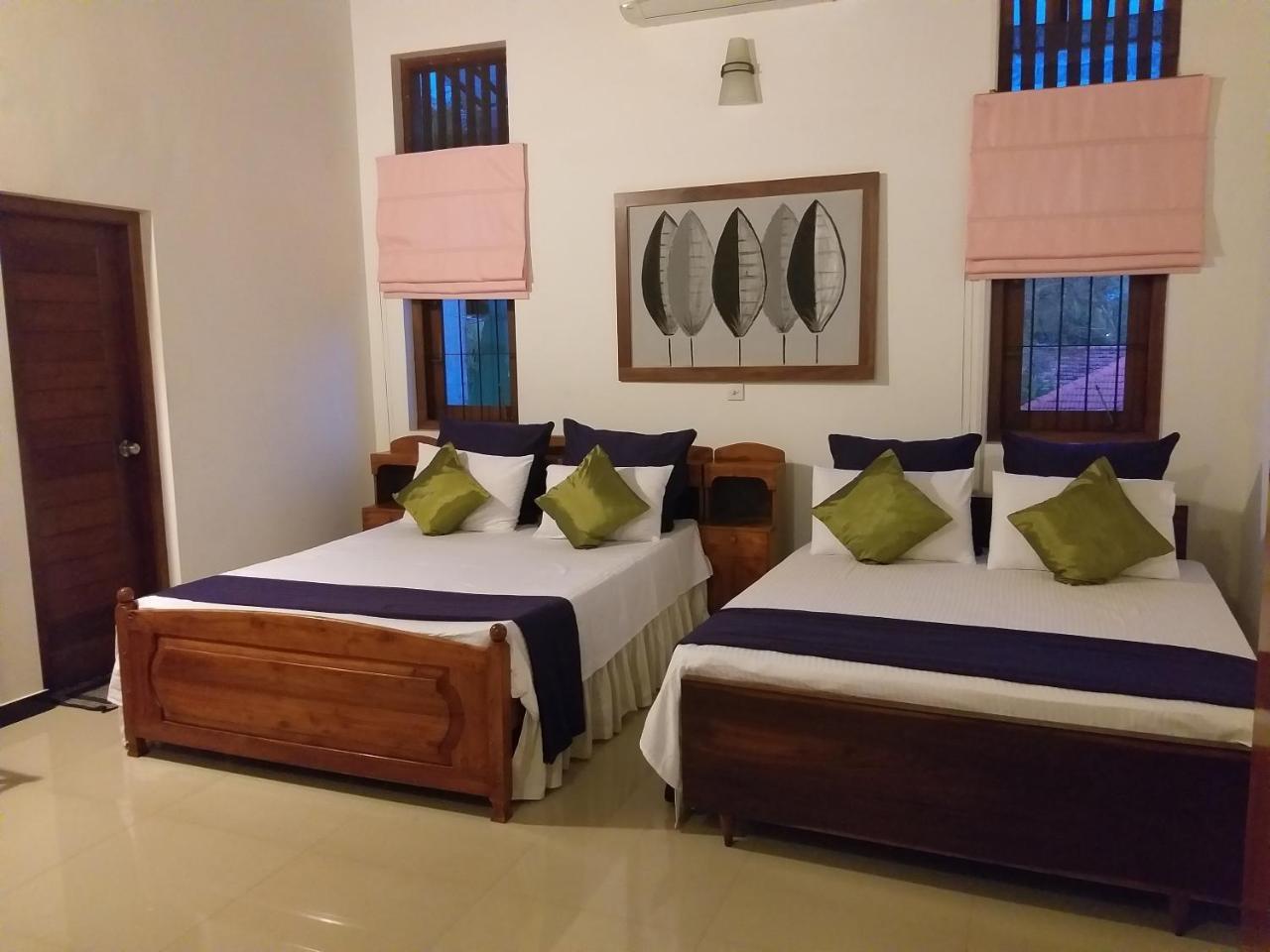 Cosy Nest Home Stay Negombo Værelse billede