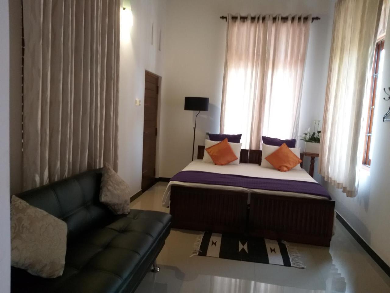 Cosy Nest Home Stay Negombo Værelse billede
