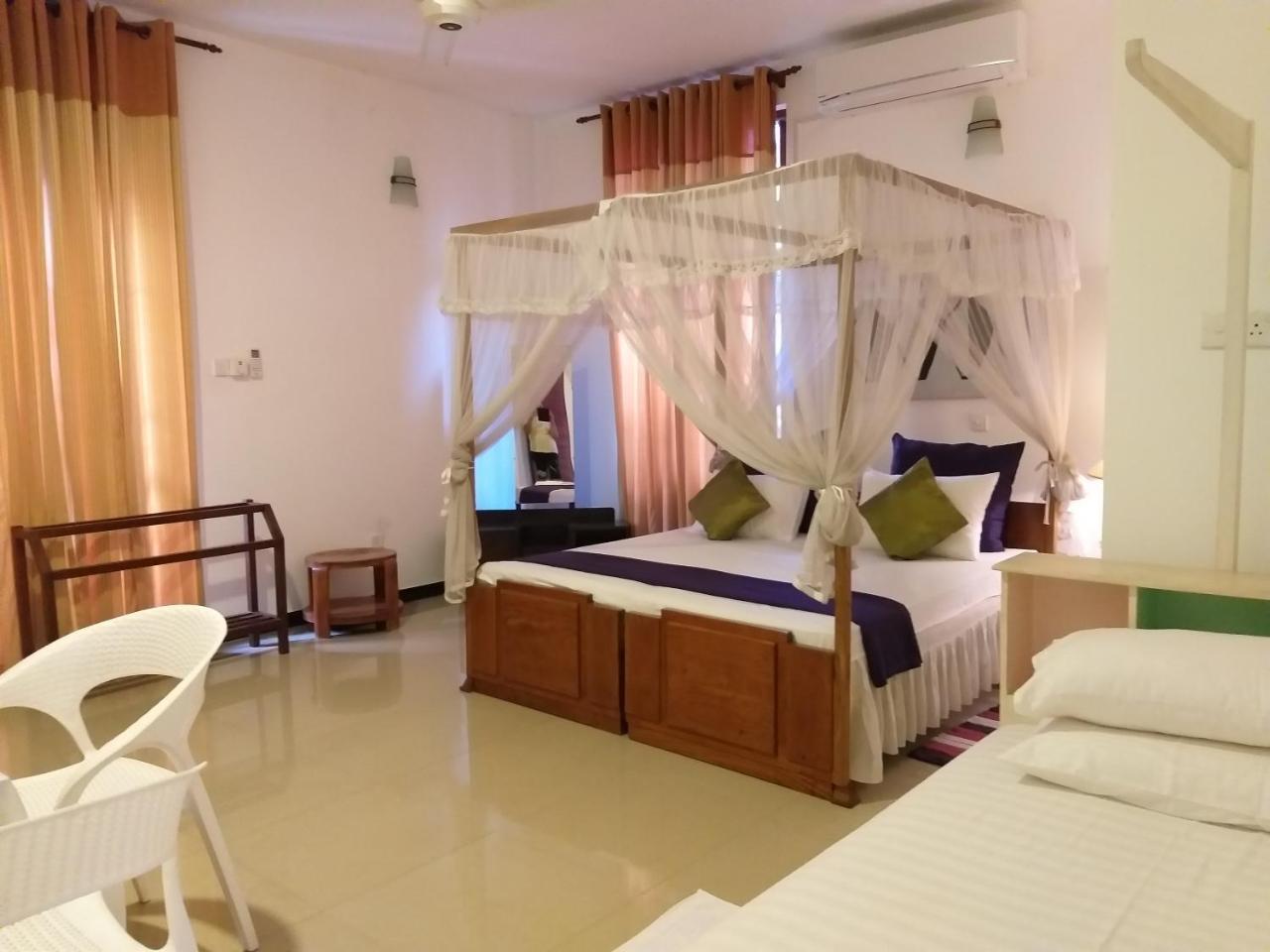 Cosy Nest Home Stay Negombo Værelse billede